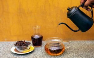 image of coffee cherry tea being poured